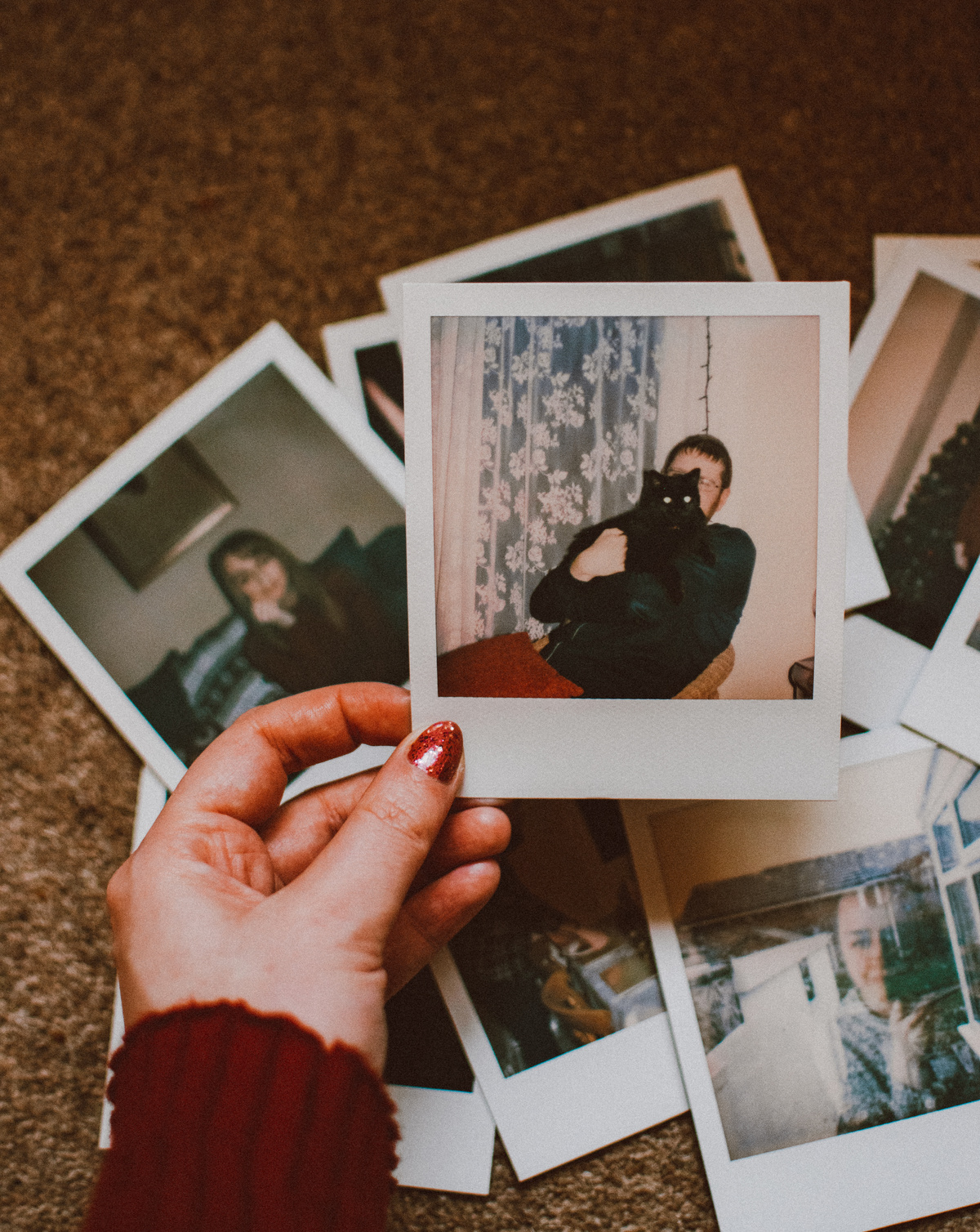 Photo of Person Holding Polaroid
